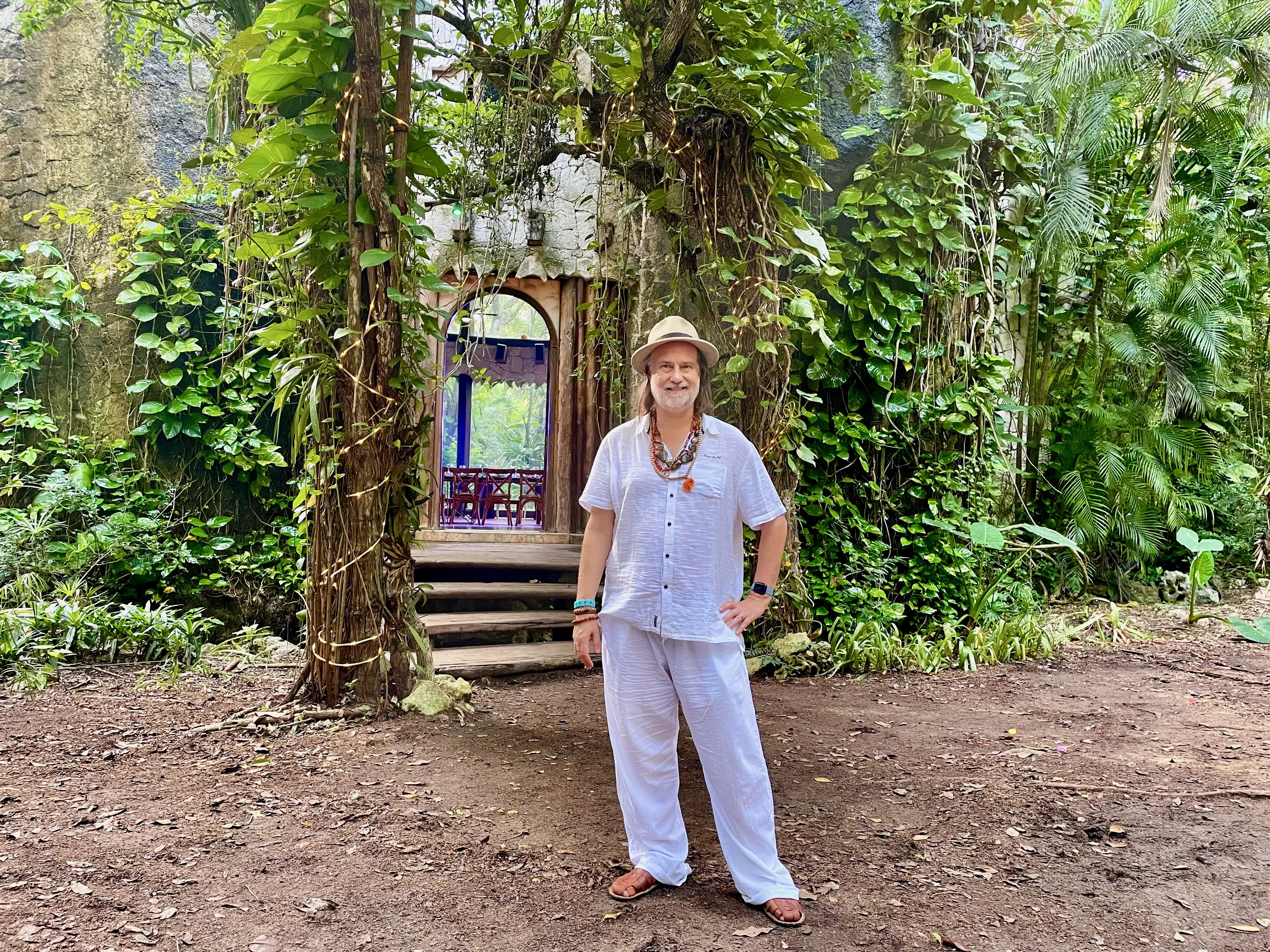 Christopher Sherrod in a lush garden